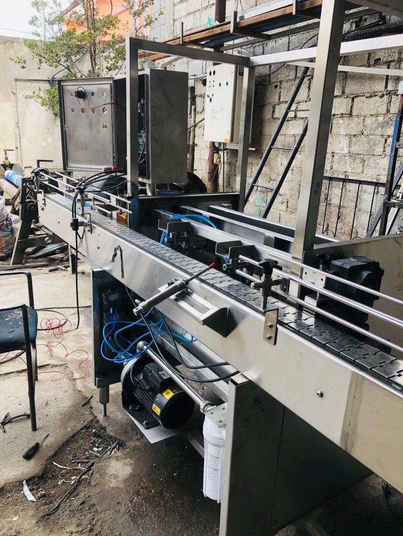 MAQUINA ENJUAGADORA DE BOTELLAS 