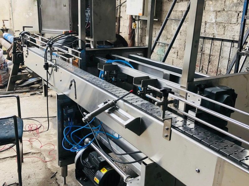 MAQUINA ENJUAGADORA DE BOTELLAS 